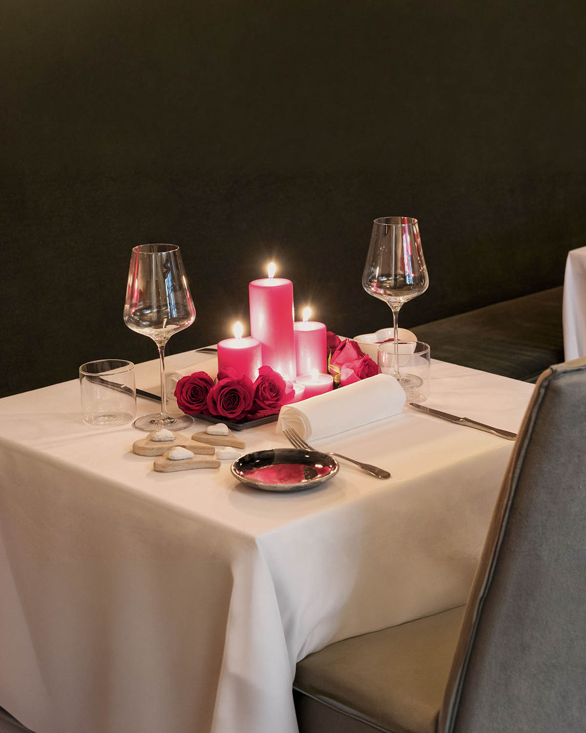 A candlelit table set for two